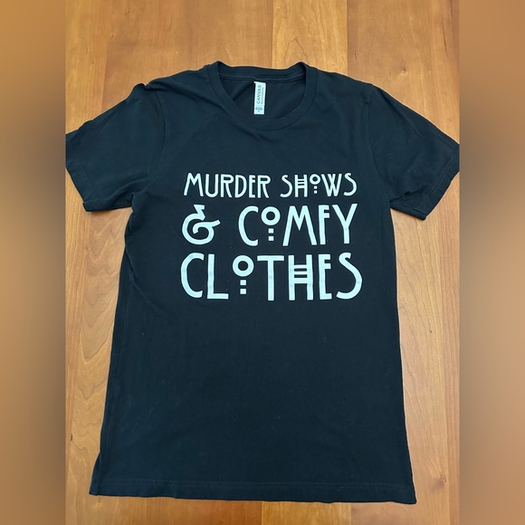 Tops - 100% black cotton tshirt sz small. “Murder shows & comfy clothes” decal on front